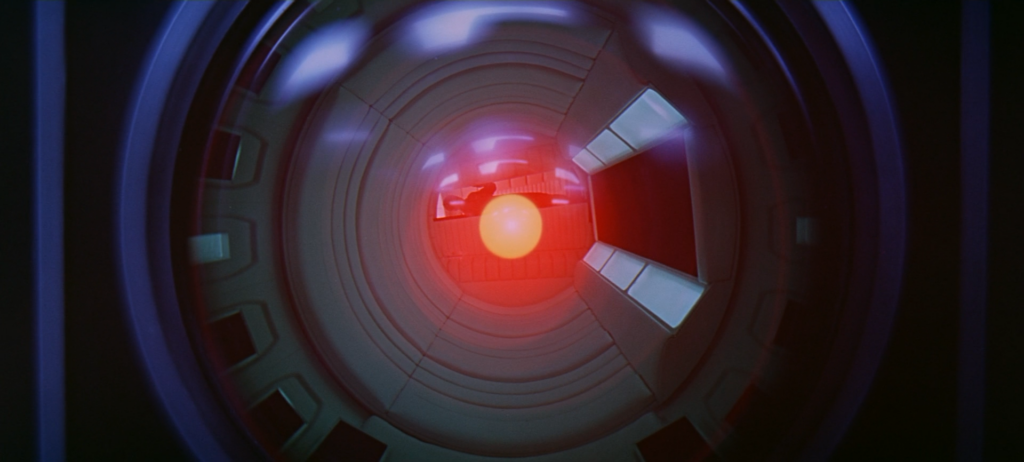 Screenshot from the movie showing the visible red eye element of the HAL-9000 computer from 2001: A Space Odyssey.